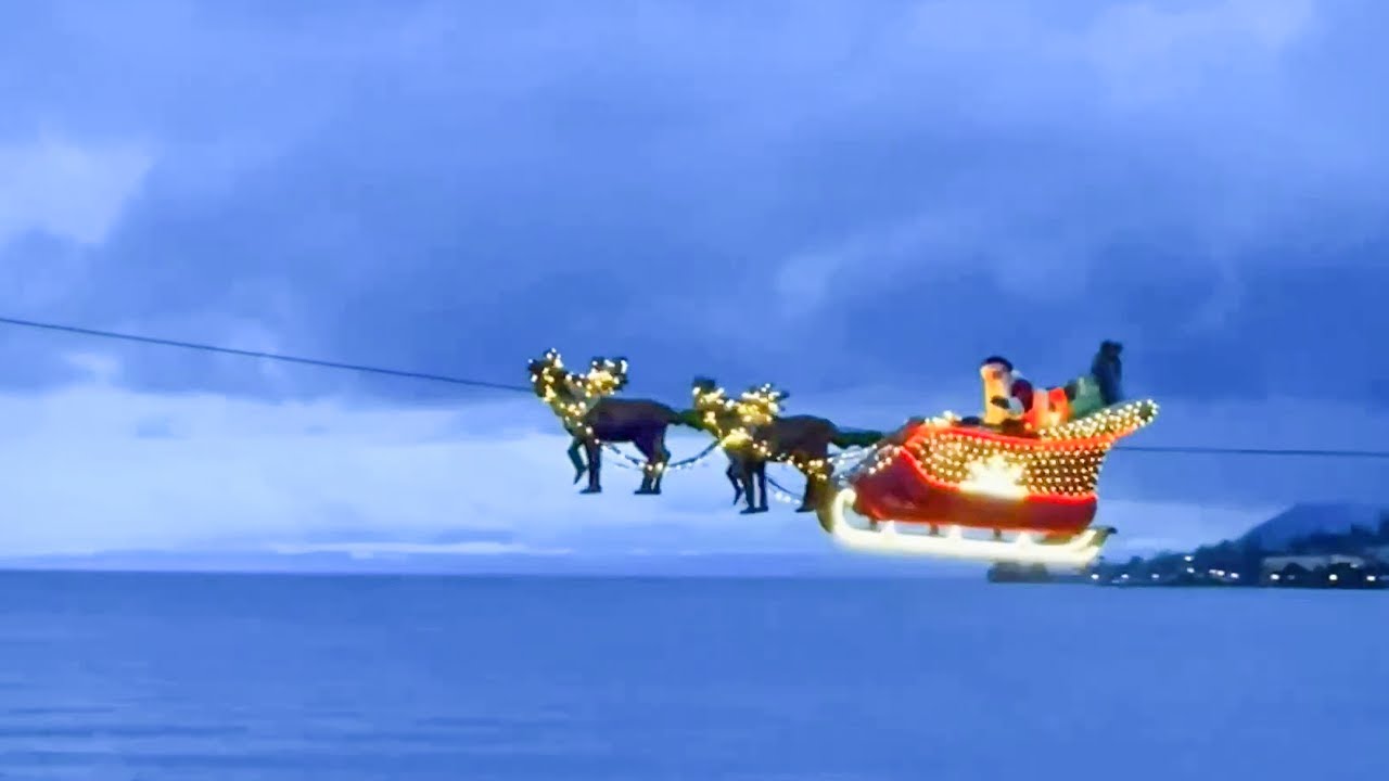 Santa Claus Flying Over Lake Geneva in Montreux, Switzerland || WooGlobe